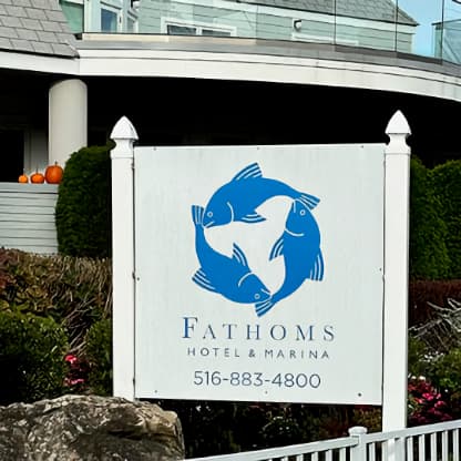 Enter at the Fathoms sign on the South side of the building.